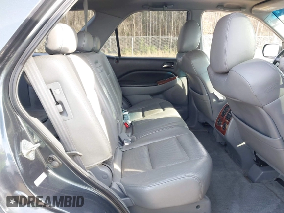 2004 Acura MDX with VIN 2HNYD18204H562124, listed as a IAAI auction lot 41453903 with 146,999 mi miles. Bid and sale history available at carsss.com. Image 8.
