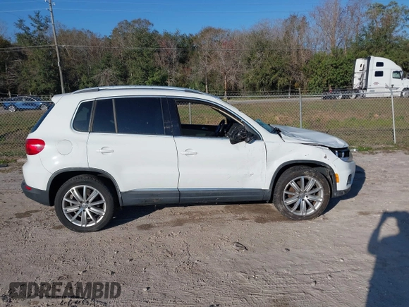 2015 Volkswagen Tiguan SE with VIN WVGAV7AX5FW600170, listed as a IAAI auction lot 41460660 with Not provided miles and . Bid and sale history available at DreamBid. Image 13.