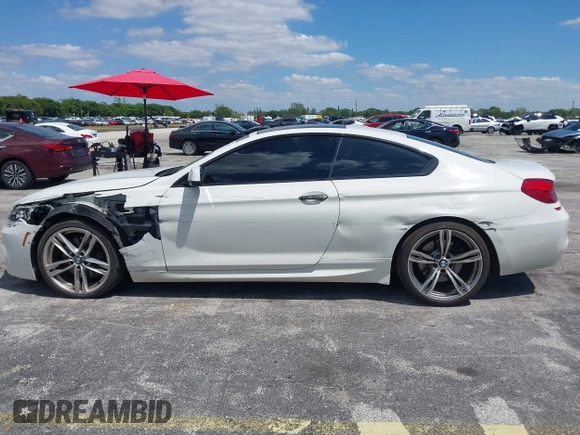 2014 BMW 6 Series 650i with VIN WBAYM9C55ED248244, listed as a IAAI auction lot 42043456 with 144,664 mi miles and . Bid and sale history available at DreamBid. Image 14.