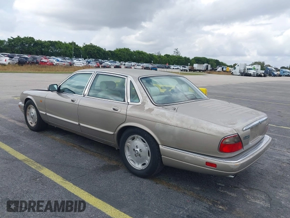 1997 Jaguar XJ with VIN SAJHX1243VC811786, listed as a IAAI auction lot 41451521 with Not provided miles and . Bid and sale history available at DreamBid. Image 3.