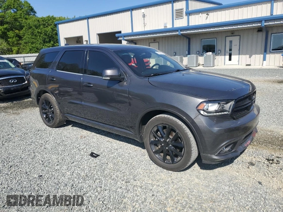 2017 Dodge Durango R/T with VIN 1C4SDHCT3HC814249, listed as a Copart auction lot 52585045 with 140,809 mi miles and Salvage title. Bid and sale history available at DreamBid. Image 4.