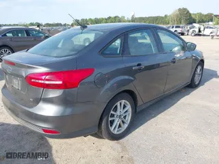 2018 Ford Focus SE with VIN 1FADP3F24JL207231, listed as a IAAI auction lot 42024366 with 134,446 mi miles. Bid and sale history available at carsss.com. Image 4.