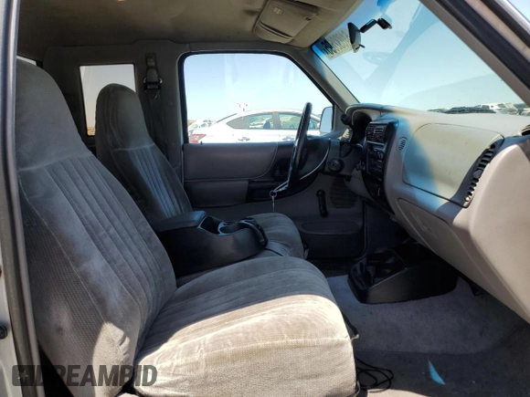 1997 Ford Ranger XLT z VIN 1FTCR14X7VPA98300, wystawiony jako Copart lot #64032695 z przebiegiem 469 086 mil mil oraz Czysty tytuł • Clean title. Historia ofert i sprzedaży dostępna na DreamBid. Obrazek 10.