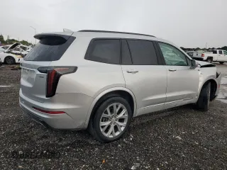 2020 Cadillac XT6 AWD Sport with VIN 1GYKPGRSXLZ217891, listed as a Copart auction lot 67915354 with 34,143 mi miles and Salvage Title. Bid and sale history available at carsss.com. Image 3.