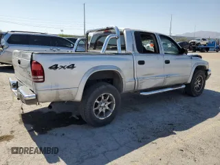 2004 Dodge Dakota SLT with VIN 1D7HG48N74S509797, listed as a Copart auction lot 57797055 with 214,275 mi miles and Salvage title. Bid and sale history available at DreamBid. Image 3.