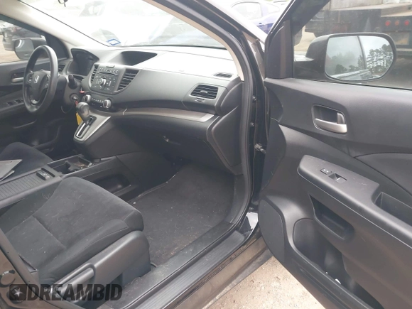 2013 Honda CR-V LX with VIN 3CZRM3H39DG709047, listed as a IAAI auction lot 41894762 with 144,788 mi miles and . Bid and sale history available at carsss.com. Image 5.