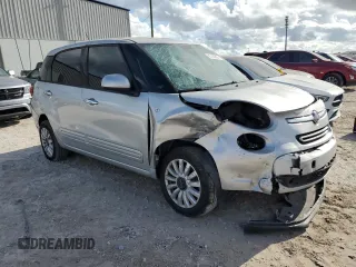 2014 FIAT 500L Easy with VIN ZFBCFABH1EZ027525, listed as a Copart auction lot 85187854 with 128,837 mi miles and Salvage Title. Bid and sale history available at carsss.com. Image 4.