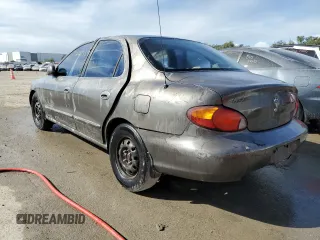 2000 Hyundai Elantra GLS z VIN KMHJF35F6YU912049, wystawiony jako Copart lot #64330472 z przebiegiem 222 733 mil mil oraz Nie do naprawy • Non repairable. Historia ofert i sprzedaży dostępna na DreamBid. Obrazek 3.