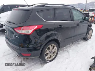 2016 Ford Escape SE z VIN 1FMCU9G92GUA33686, wystawiony jako IAAI lot #41490107 z przebiegiem 99 938 mil mil oraz . Historia ofert i sprzedaży dostępna na DreamBid. Obrazek 4.