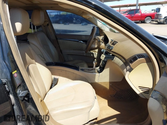 2007 Mercedes-Benz E-Class Sport 5.5L with VIN WDBUF72XX7A988796, listed as a IAAI auction lot 42052924 with 180,169 mi miles. Bid and sale history available at carsss.com. Image 5.