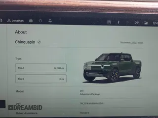 2022 Rivian R1T Adventure z VIN 7FCTGAAA8NN015369, wystawiony jako IAAI lot #41407842 z przebiegiem 22 507 mil mil oraz . Historia ofert i sprzedaży dostępna na DreamBid. Obrazek 7.