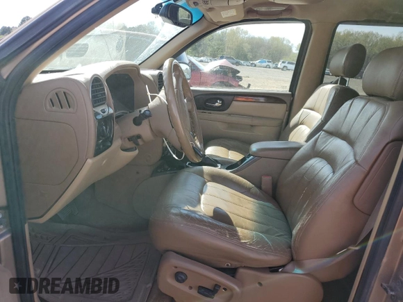 2003 GMC Envoy SLT z VIN 1GKDS13S032134647, wystawiony jako Copart lot #50137325 z przebiegiem 217 878 mil mil oraz Szkody całkowita. Historia ofert i sprzedaży dostępna na DreamBid. Obrazek 7.