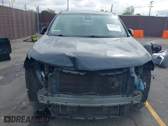 2020 Chevrolet Traverse LT Cloth z VIN 1GNERGKWXLJ119704, wystawiony jako IAAI lot #42195167 z przebiegiem 128 263 mil mil oraz . Historia ofert i sprzedaży dostępna na DreamBid. Obrazek 13.