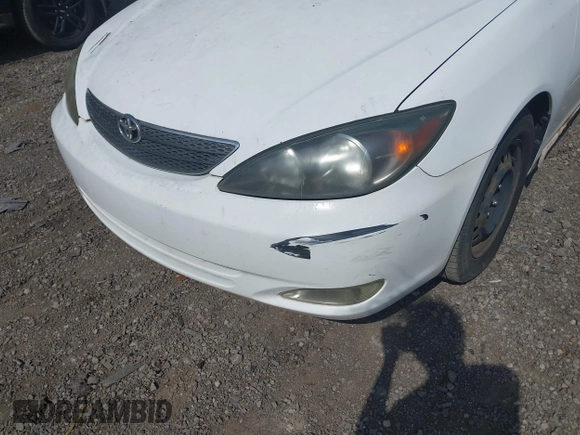 2003 Toyota Camry LE with VIN JTDBE32K830222476, listed as a IAAI auction lot 42160720 with 161,570 mi miles and . Bid and sale history available at DreamBid. Image 6.