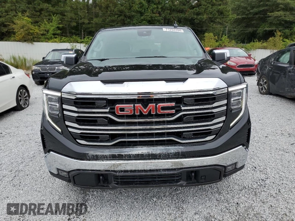 2023 GMC Sierra 1500 SLT z VIN 3GTUUDE87PG106169, wystawiony jako Copart lot #71252284 z przebiegiem 29 136 mil mil oraz Szkoda całkowita • Salvage title. Historia ofert i sprzedaży dostępna na DreamBid. Obrazek 5.