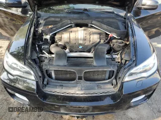 2013 BMW X6 xDrive50i z VIN 5UXFG8C5XDL591761, wystawiony jako Copart lot #54182645 z przebiegiem 117 250 mil mil oraz Szkoda całkowita • Salvage title. Historia ofert i sprzedaży dostępna na DreamBid. Obrazek 12.