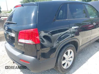 2013 Kia Sorento LX with VIN 5XYKT3A19DG381288, listed as a IAAI auction lot 42797647 with 220,000 mi miles and . Bid and sale history available at DreamBid. Image 6.