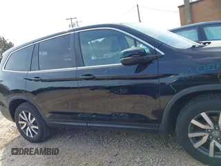 2021 Honda Pilot EX-L with VIN 5FNYF6H57MB064595, listed as a IAAI auction lot 41942327 with 46,150 mi miles and . Bid and sale history available at DreamBid. Image 13.