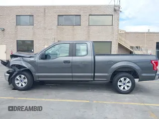 2015 Ford F-150 XL with VIN 1FTEX1CF7FKE65881, listed as a IAAI auction lot 42809438 with 122,541 mi miles and . Bid and sale history available at DreamBid. Image 14.