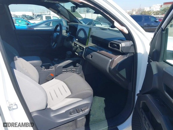 2024 Toyota Tacoma 4WD SR5 with VIN 3TMLB5JN1RM050446, listed as a IAAI auction lot 41658922 with 9,369 mi miles. Bid and sale history available at carsss.com. Image 5.