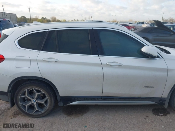 2016 BMW X1 xDrive28i with VIN WBXHT3C3XGP889461, listed as a IAAI auction lot 41757627 with 105,681 mi miles. Bid and sale history available at carsss.com. Image 13.
