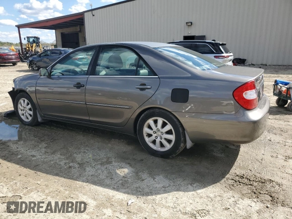 2003 Toyota Camry LE with VIN 4T1BE30K43U724778, listed as a Copart auction lot 53515605 with 176,568 mi miles and Salvage Title. Bid and sale history available at DreamBid. Image 2.