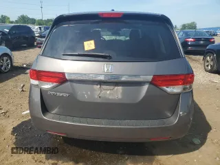 2014 Honda Odyssey EX-L with VIN 5FNRL5H61EB046093, listed as a Copart auction lot 61930335 with Not provided miles and Salvage title. Bid and sale history available at DreamBid. Image 6.