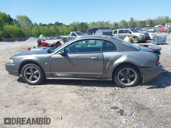 2003 Ford Mustang Standard z VIN 1FAFP40463F327753, wystawiony jako IAAI lot #42005257 z przebiegiem 325 449 mil mil oraz . Historia ofert i sprzedaży dostępna na DreamBid. Obrazek 15.