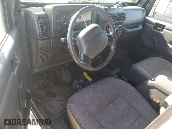 2002 Jeep Wrangler Sport with VIN 1J4FA49S22P703610, listed as a Copart auction lot 50900605 with 70,045 mi miles and Salvage Title. Bid and sale history available at carsss.com. Image 8.