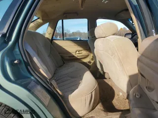 1997 Ford Crown Victoria with VIN 2FALP73W6VX173232, listed as a Copart auction lot 77805094 with 228,871 mi miles and Salvage Title. Bid and sale history available at carsss.com. Image 11.