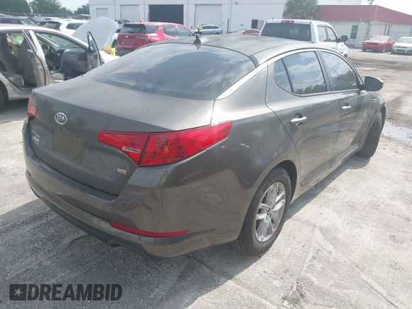 2011 Kia Optima LX with VIN KNAGM4A70B5162915, listed as a IAAI auction lot 42094325 with 156,169 mi miles and . Bid and sale history available at carsss.com. Image 4.