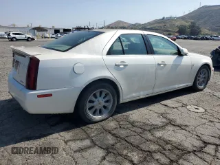 2006 Cadillac STS z VIN 1G6DW677560132284, wystawiony jako Copart lot #55707415 z przebiegiem 329 037 mil mil oraz Czysty tytuł • Clean title. Historia ofert i sprzedaży dostępna na DreamBid. Obrazek 3.