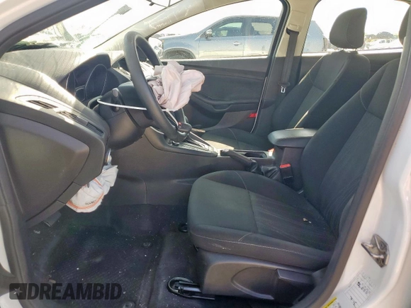 2018 Ford Focus SE z VIN 1FADP3F29JL225126, wystawiony jako Copart lot #52817265 z przebiegiem Nie podano mil oraz Szkoda całkowita • Salvage title. Historia ofert i sprzedaży dostępna na DreamBid. Obrazek 7.