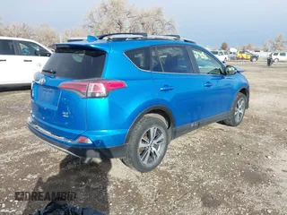 2016 Toyota RAV4 XLE with VIN JTMRFREV4GD186580, listed as a IAAI auction lot 40916703 with 117,120 mi miles and . Bid and sale history available at DreamBid. Image 4.