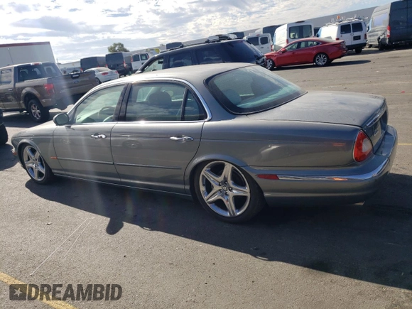 2005 Jaguar XJ with VIN SAJWA79C15SG40523, listed as a Copart auction lot 77994844 with 113,634 mi miles and Clean Title. Bid and sale history available at carsss.com. Image 2.