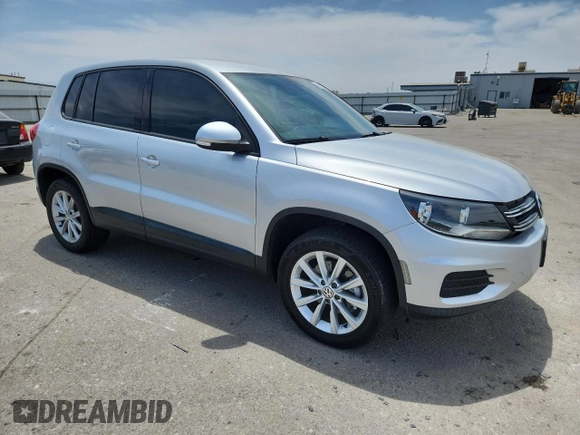 2014 Volkswagen Tiguan SE with VIN WVGAV3AX3EW590861, listed as a Copart auction lot 58517535 with 68,481 mi miles and Salvage title. Bid and sale history available at DreamBid. Image 4.