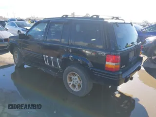 1998 Jeep Grand Cherokee Limited z VIN 1J4GZ78Y3WC105625, wystawiony jako IAAI lot #41742805 z przebiegiem 222 045 mil mil oraz . Historia ofert i sprzedaży dostępna na DreamBid. Obrazek 3.
