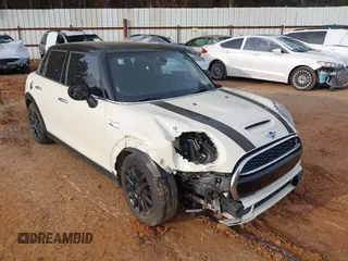 2015 MINI Hardtop 4 Door S z VIN WMWXU3C50F2B59450, wystawiony jako IAAI lot #41271841 z przebiegiem 70 719 mil mil oraz . Historia ofert i sprzedaży dostępna na DreamBid. Obrazek 1.