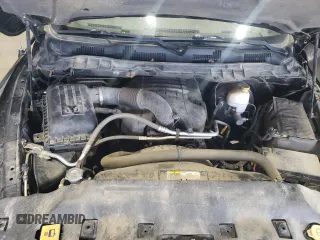 2014 Ram 1500 Express z VIN 1C6RR7FT9ES152773, wystawiony jako Copart lot #61879354 z przebiegiem 124 824 mil mil oraz Szkoda całkowita • Salvage title. Historia ofert i sprzedaży dostępna na DreamBid. Obrazek 11.
