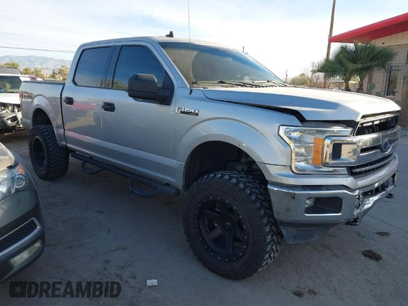 2019 Ford F-150 XL with VIN 1FTEW1E43KKE23264, listed as a IAAI auction lot 41395865 with 106,898 mi miles. Bid and sale history available at carsss.com. Image 1.
