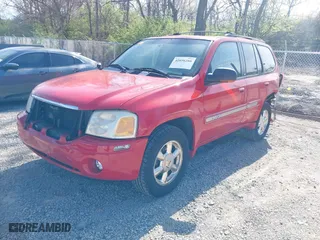 2002 GMC Envoy SLT with VIN 1GKDT13S322512505, listed as a IAAI auction lot 42056266 with 139,793 mi miles. Bid and sale history available at carsss.com. Image 2.