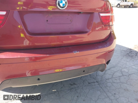 2014 BMW X6 xDrive35i z VIN 5UXFG2C57E0C44052, wystawiony jako IAAI lot #40231766 z przebiegiem 131 573 mil mil oraz . Historia ofert i sprzedaży dostępna na DreamBid. Obrazek 19.