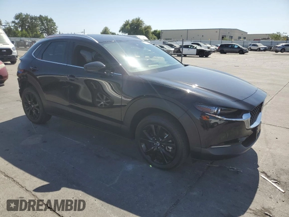 2023 Mazda CX-30 Premium Plus with VIN 3MVDMBEY0PM578346, listed as a Copart auction lot 58572345 with 14,027 mi miles and Salvage title. Bid and sale history available at DreamBid. Image 4.