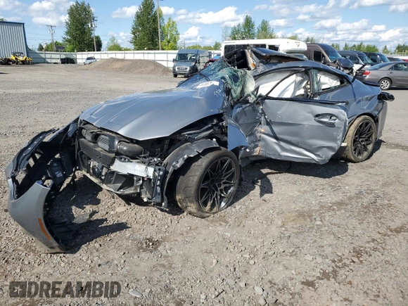 2022 BMW M4 Competition xDrive z VIN WBS43AZ05NCK39222, wystawiony jako Copart lot #55253625 z przebiegiem Nie podano mil oraz Nie do naprawy • Non repairable. Historia ofert i sprzedaży dostępna na DreamBid. Obrazek 1.