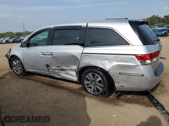 2014 Honda Odyssey Touring with VIN 5FNRL5H93EB034263, listed as a Copart auction lot 57254485 with 150,084 mi miles and Salvage title. Bid and sale history available at DreamBid. Image 2.