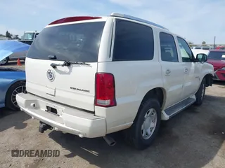 2005 Cadillac Escalade z VIN 1GYEC63N25R200026, wystawiony jako IAAI lot #41761210 z przebiegiem 226 747 mil mil oraz . Historia ofert i sprzedaży dostępna na DreamBid. Obrazek 4.