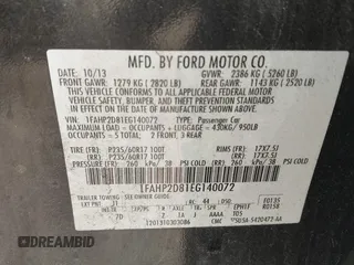 2014 Ford Taurus SE z VIN 1FAHP2D81EG140072, wystawiony jako IAAI lot #42124900 z przebiegiem 116 560 mil mil oraz . Historia ofert i sprzedaży dostępna na DreamBid. Obrazek 9.
