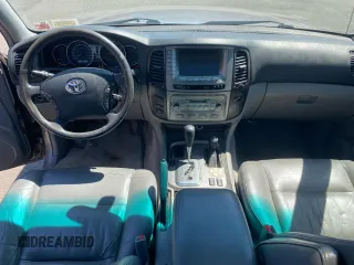 2004 Toyota Land Cruiser z VIN JTEHT05J542063838, wystawiony jako Copart lot #55477635 z przebiegiem 290 726 mil mil oraz Czysty tytuł • Clean title. Historia ofert i sprzedaży dostępna na DreamBid. Obrazek 9.