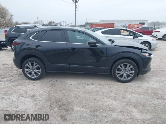 2023 Mazda CX-30 S Select with VIN 3MVDMBBM5PM540662, listed as a IAAI auction lot 42057718 with 16,289 mi miles and . Bid and sale history available at DreamBid. Image 13.