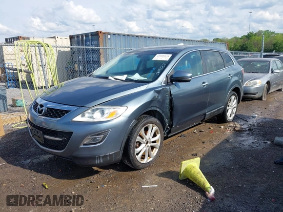 2012 Mazda CX-9 Grand Touring with VIN JM3TB3DV8C0364337, listed as a IAAI auction lot 42088838 with 170,820 mi miles. Bid and sale history available at carsss.com. Image 2.